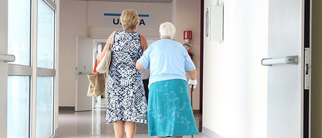Elderly woman leaving hospital.jpg