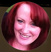 Smiling woman with auburn hair