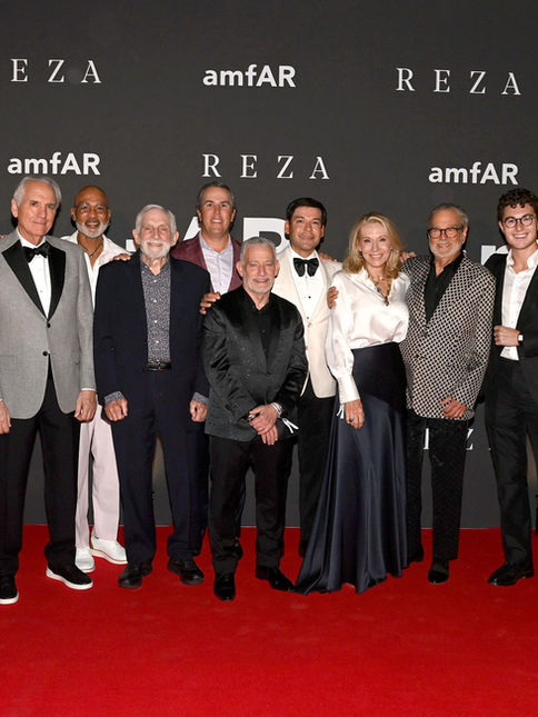 Guests at an amfAR gala for First Class Magazine Dallas Magazine.