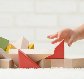 Baby Playing with Building Blocks