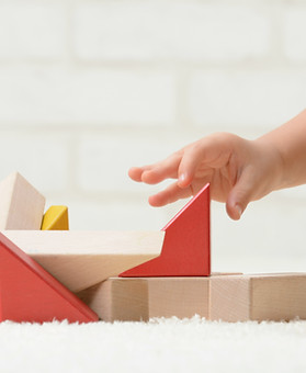 Baby Playing with Building Blocks