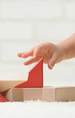 Baby Playing with Building Blocks