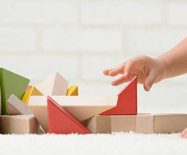 Baby Playing with Building Blocks