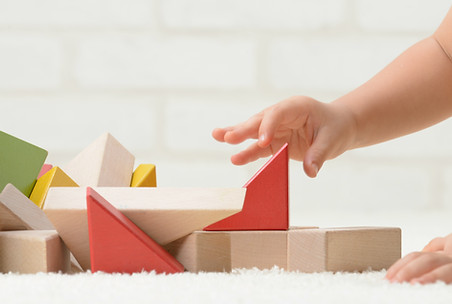 Baby Playing with Building Blocks