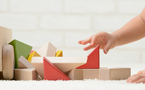 Baby Playing with Building Blocks