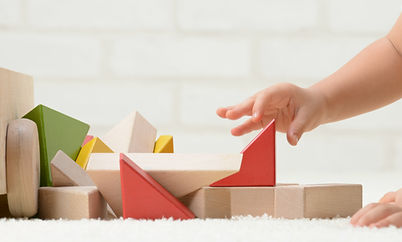 Baby Playing with Building Blocks