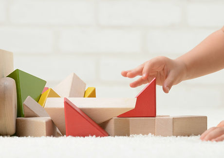 Baby Playing with Building Blocks