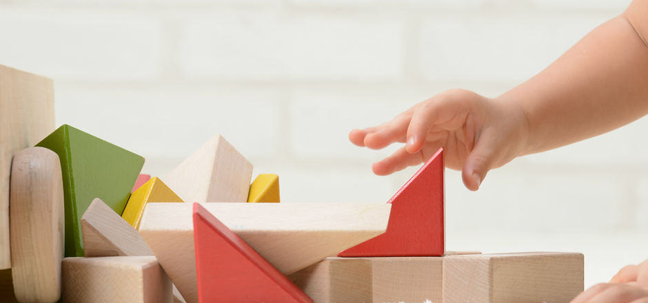 Baby Playing with Building Blocks