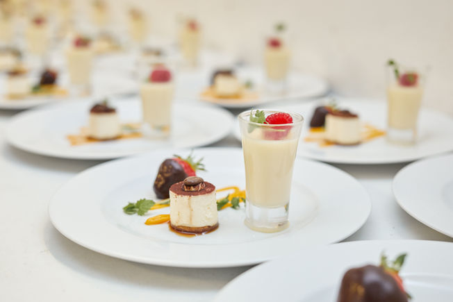 Desserts served on white china plates
