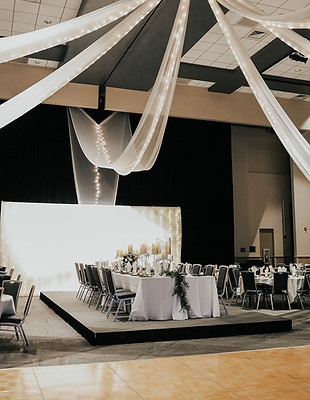 Head table for a wedding in the Banquet Hall at the Mayo Clinic Health System Event Center