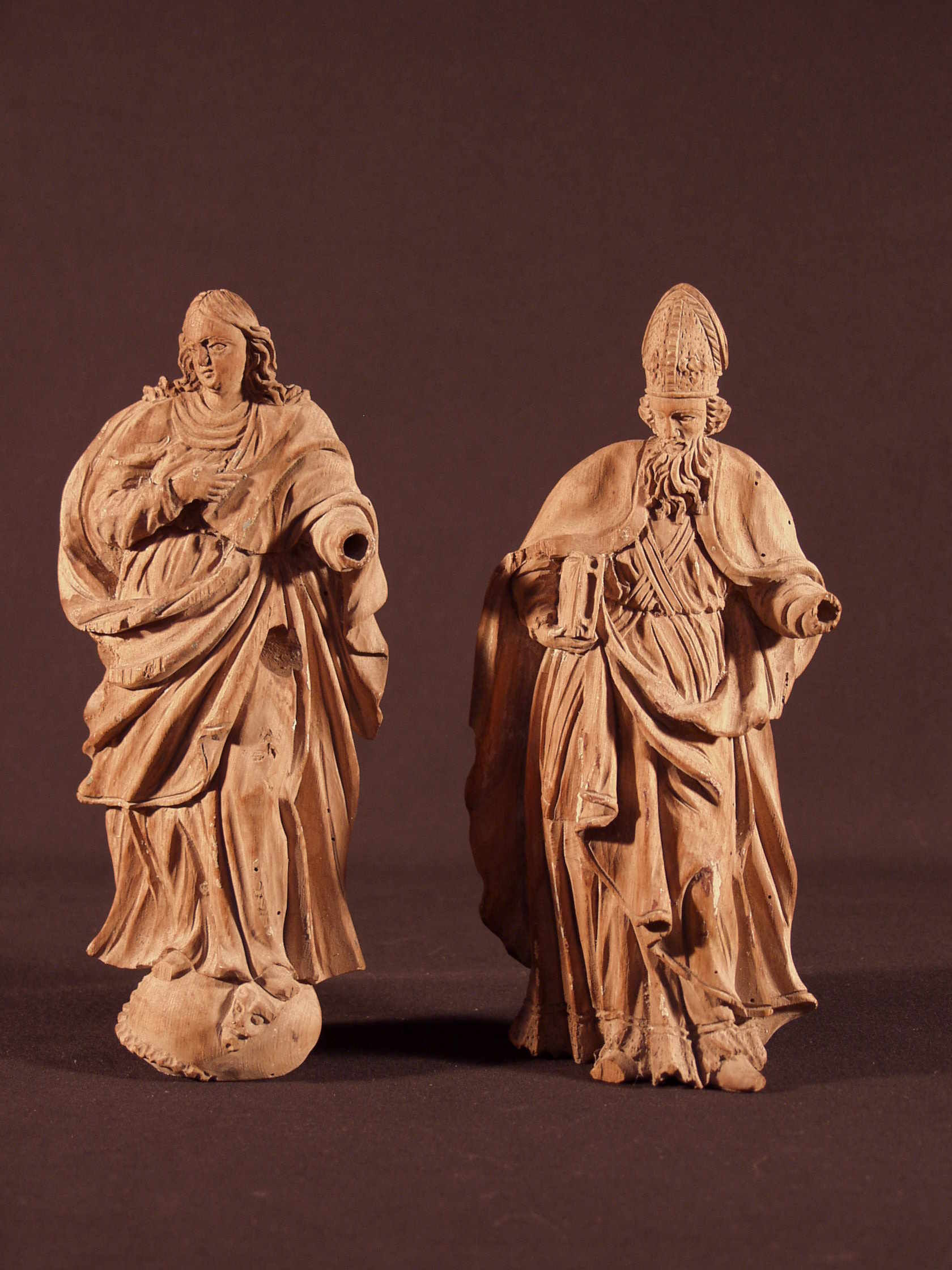 Carved wood figures of the Virgin and a bishop, 17th century (G26)