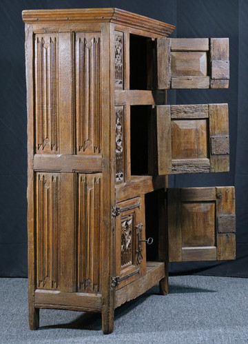 An exceptional Flemish Gothic oak cupboard, late 15th / early 16th