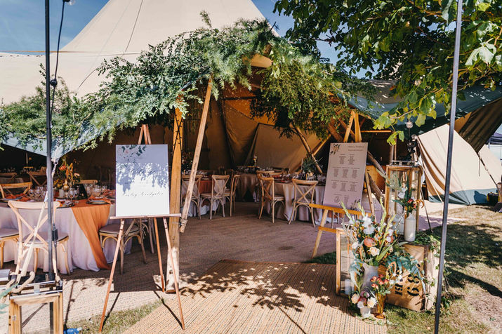 order of the day showed in a marquee. Wedding in a family farm in Hildenborough, Kent