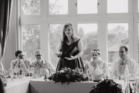 Bride giving a speech at the top table at Hartsfield Manor Hotel, Betchworth.