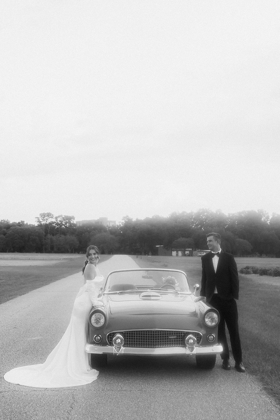Baton Rouge wedding photos with vintage car on film taken by New Orleans Wedding and Portrait photographer Sierra Beaulieu black and white