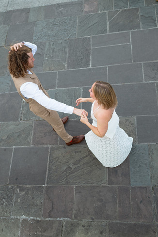 a photo of a man and woman dancing from above 