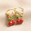 Thumbnail: Enamel Cherry Huggie Hoop Earrings in Gold