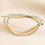 Thumbnail: Stainless Steel and Turquoise Beaded Double Layer Cord Bracelet in Gold