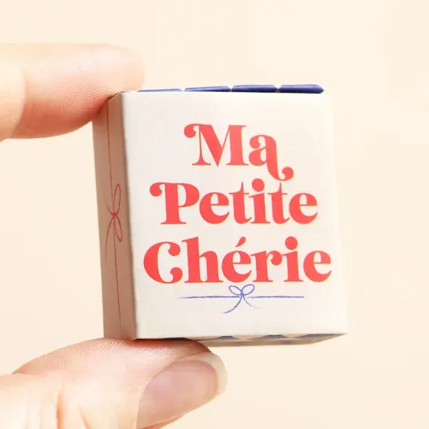Thumbnail: Tiny Matchbox Ceramic Croissant Token