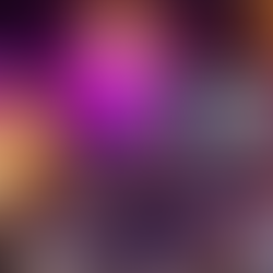 Zac Brown Band performs on stage with lights, featuring a guitarist in a hat, drummer, violinist, and a woman in a yellow dress playing guitar.