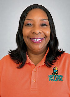 Photo of Hotdog Palate's President/Co-Founder smiling in company headshot.