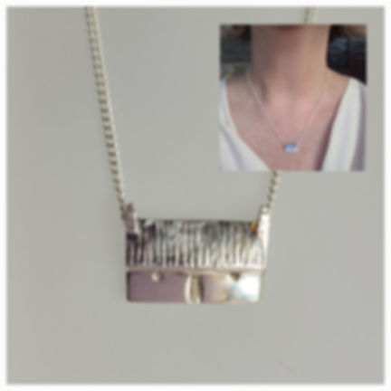 Cute little pendant depicting a traditional thatched one story Scottish dwelling. 1.5 x 1cm. Tiny door, a window either side