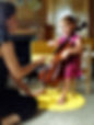 Child plays piano in music lesson at Upper Beaches Music School in East Toronto on Danforth