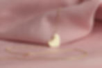 Gold jewelry on a pink background. Gift for Valentine's Day. Pleasure girlfriends, women, 