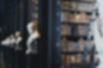 book lot on black wooden shelf_edited.jpg