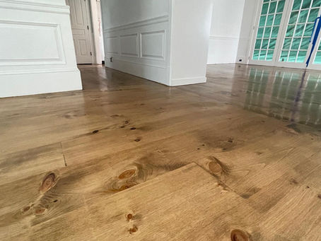 Should You Refinish or Replace Your Hardwood Floors? A Long Island Homeowner’s Guide