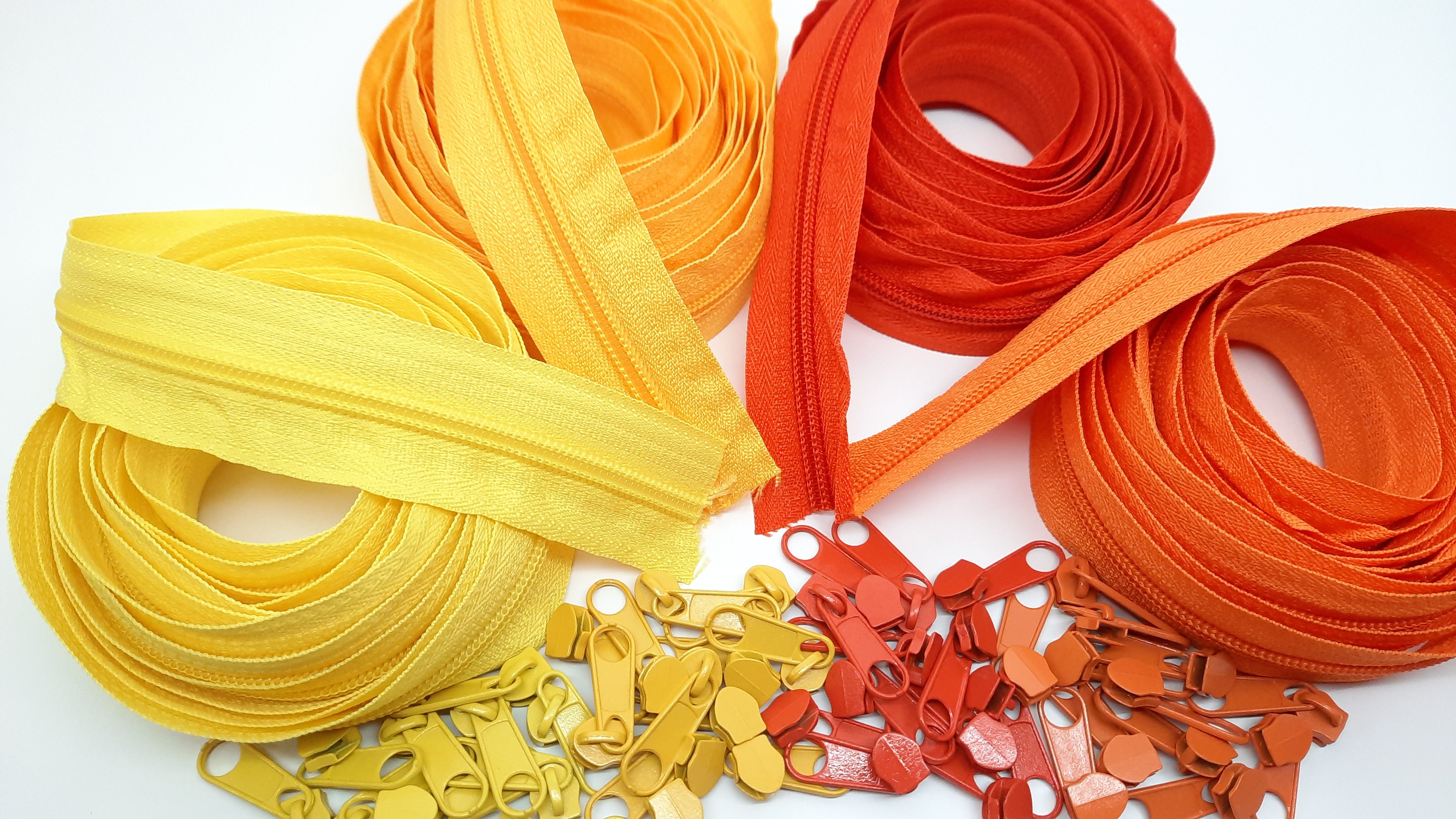 pakke 12m glidelås gul / oransje (3 meter i 4 farger)