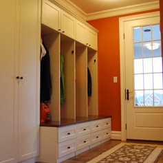 You know what this normally looks like; shoes everywhere, jackets hung on door knobs, backpacks tossed on the floor. A bench with lockers that incorporate hooks, drawers for hats and gloves and a cabinet for shoes will remedy this easily. Color: Irish Linen. Bench: Wood veneer.