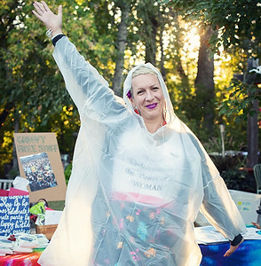 Female wearing the EcoRain® Poncho.