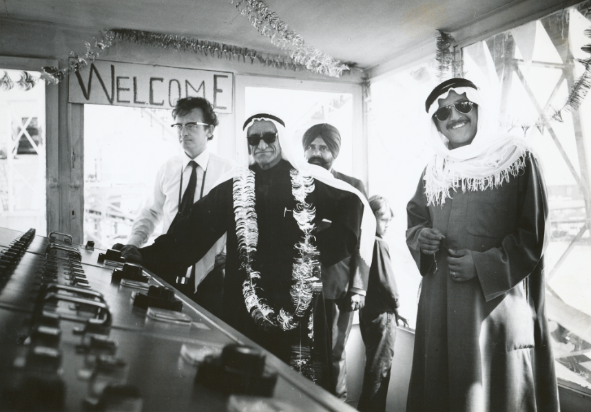 Yusuf Alghanim (with son Omar Kutayba on the right) opens the Sabiyah gravel plant - at the time the world's biggest. And there is Dad standing next to him, and that little boy in the background is me. My sister had presented Yusuf with the lei prior to entering the control room.