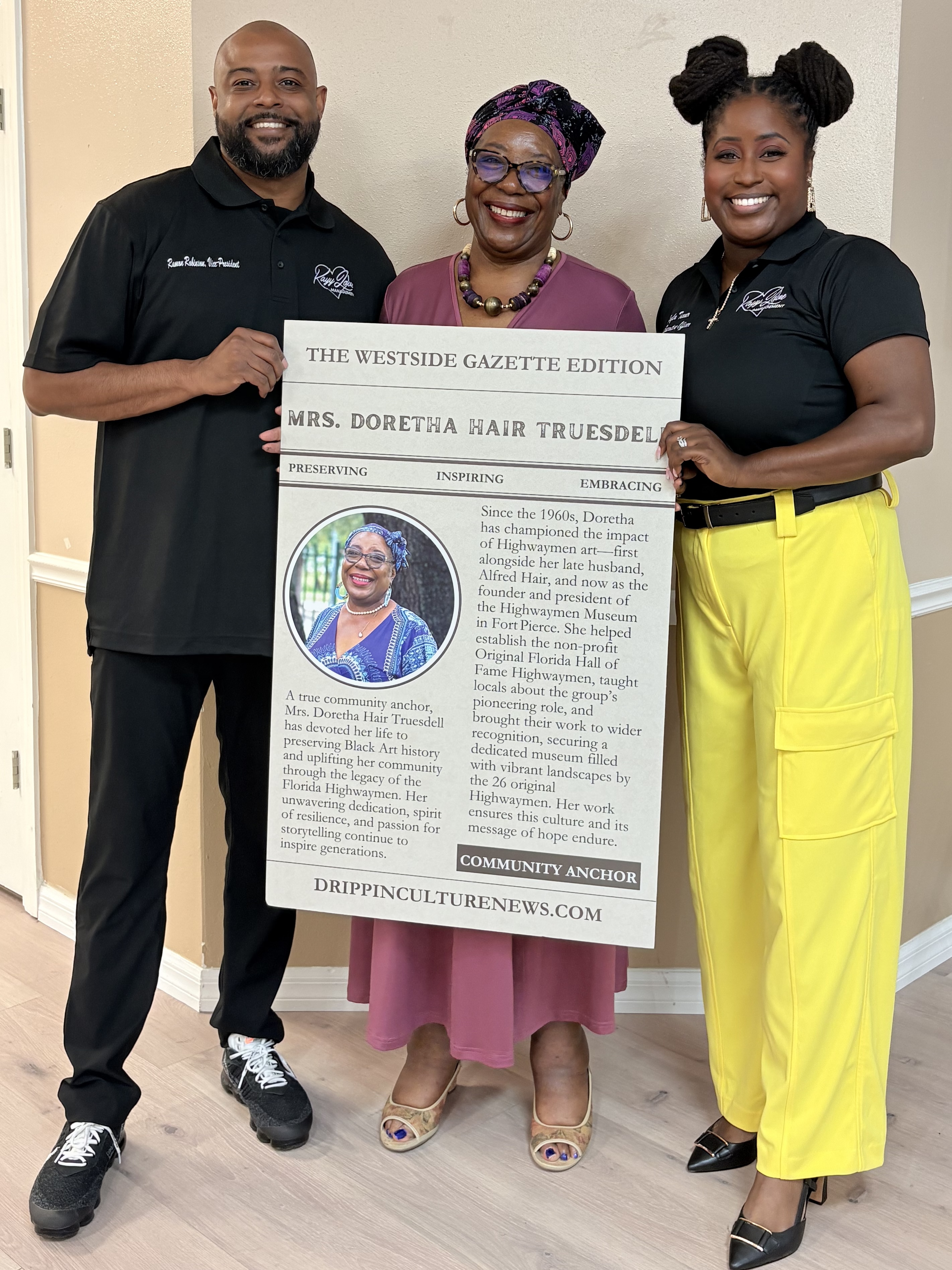 Ramon Robinson and Kalya Turner posing with trading card recipient Mrs. Doretha Hair Truesdell