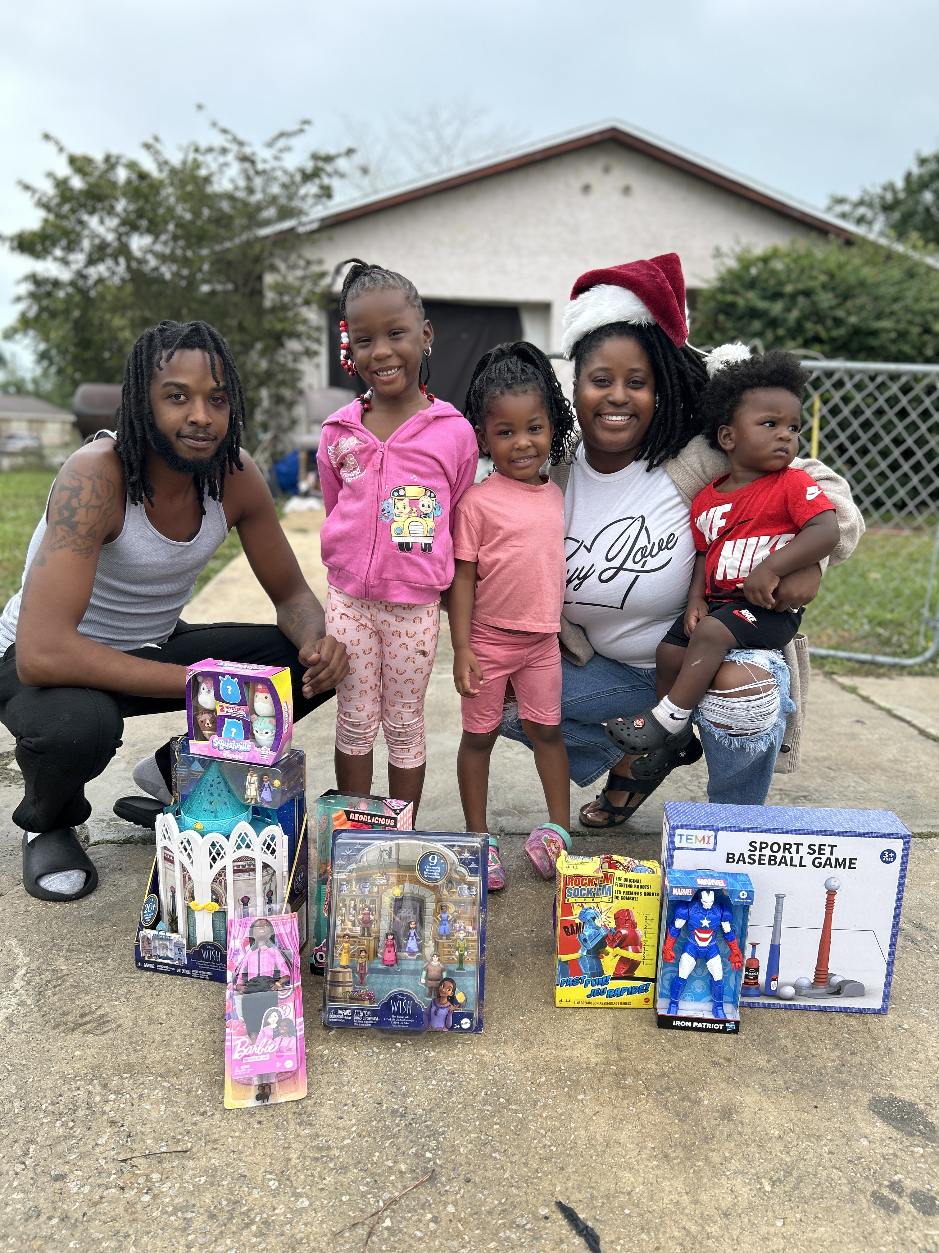 Kayy Love donating gifts to youth