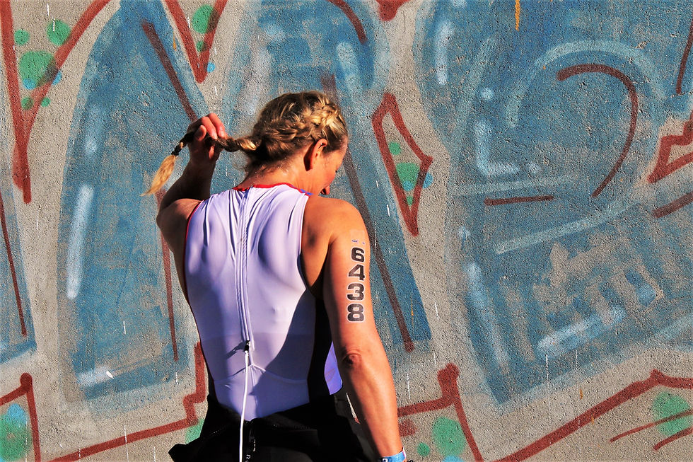 Female racestronger® athlete walking to swim start Pontevedra European Champs