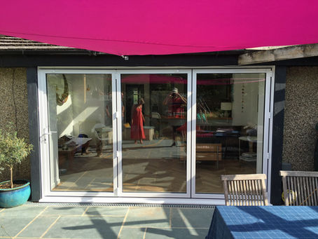 Installation of Smart Systems aluminium bi-fold doors – before and after