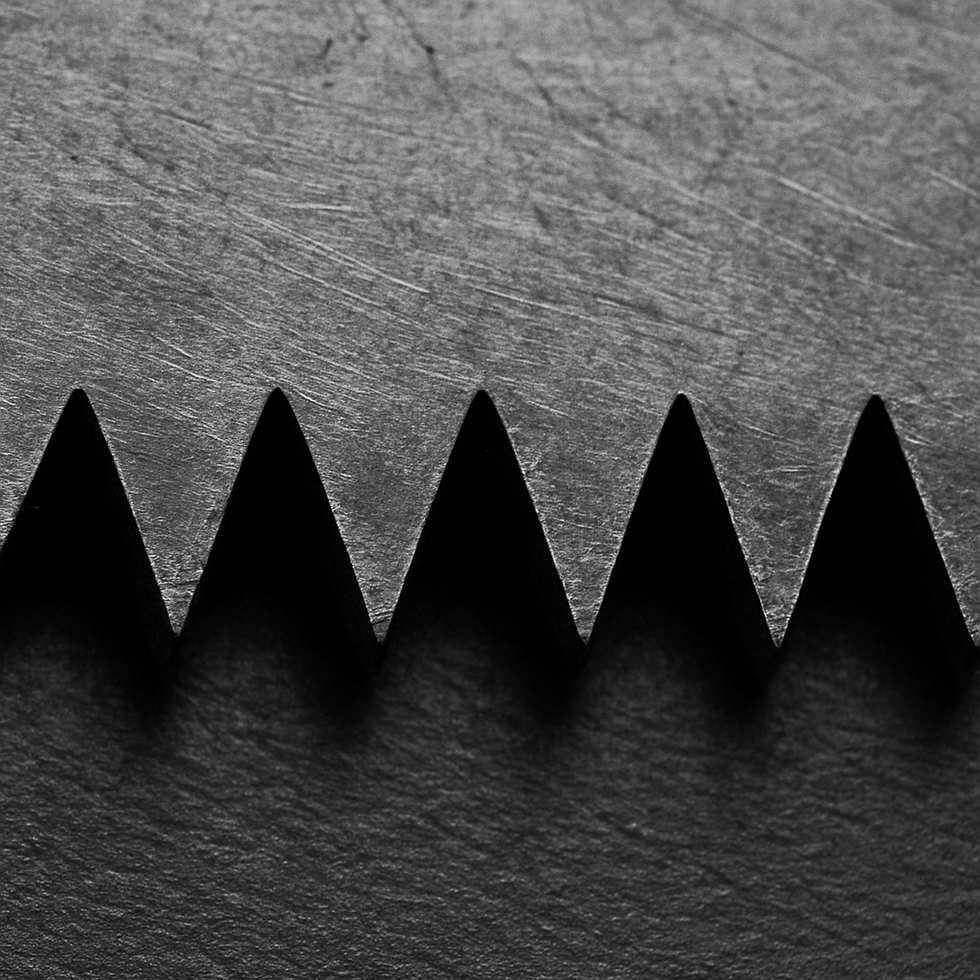 Close-up of jagged metal saw blade on a textured, dark background. The sharp, triangular teeth create a dramatic, industrial mood.
