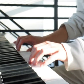 Eric Ching playing piano