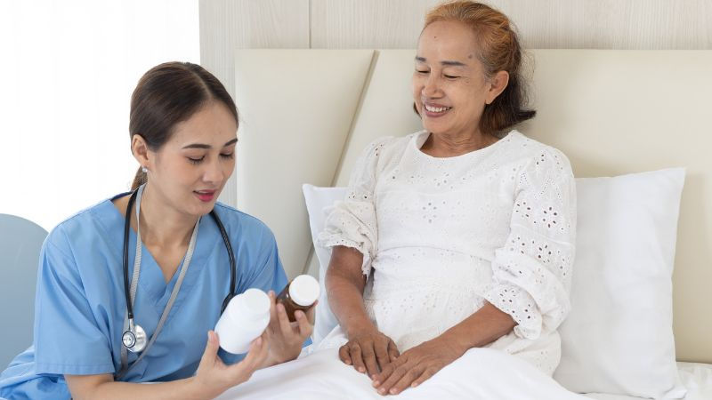 Caregiver helping with medication