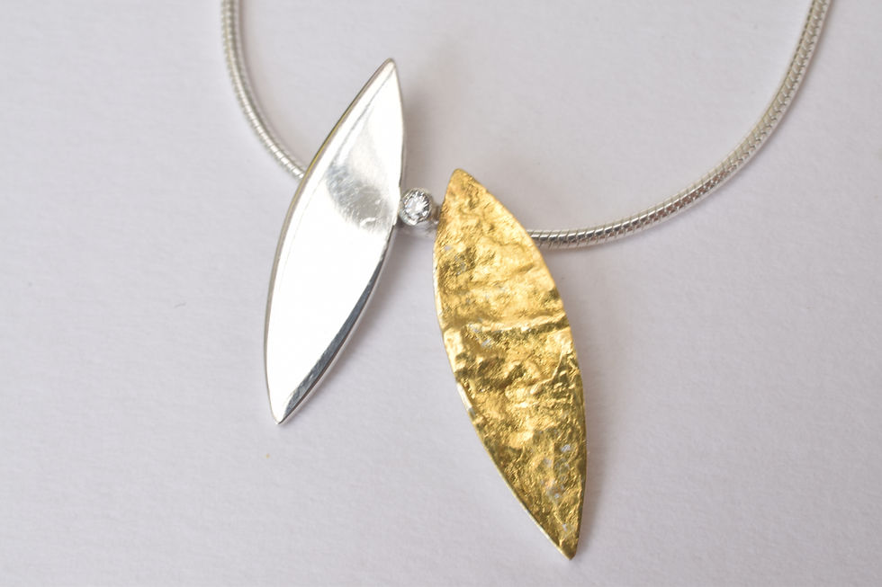 Thumbnail: Double Leaf Pendant with a Cubic Zirconia
