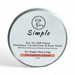 Round tin labeled Simple ALL-IN-ONE Paste Cinnamon Clove natural hair care products.