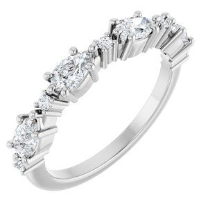 Platinum 5x3 mm Pear 4-Stone .07 CTW Natural Diamond Stackable Family Ring