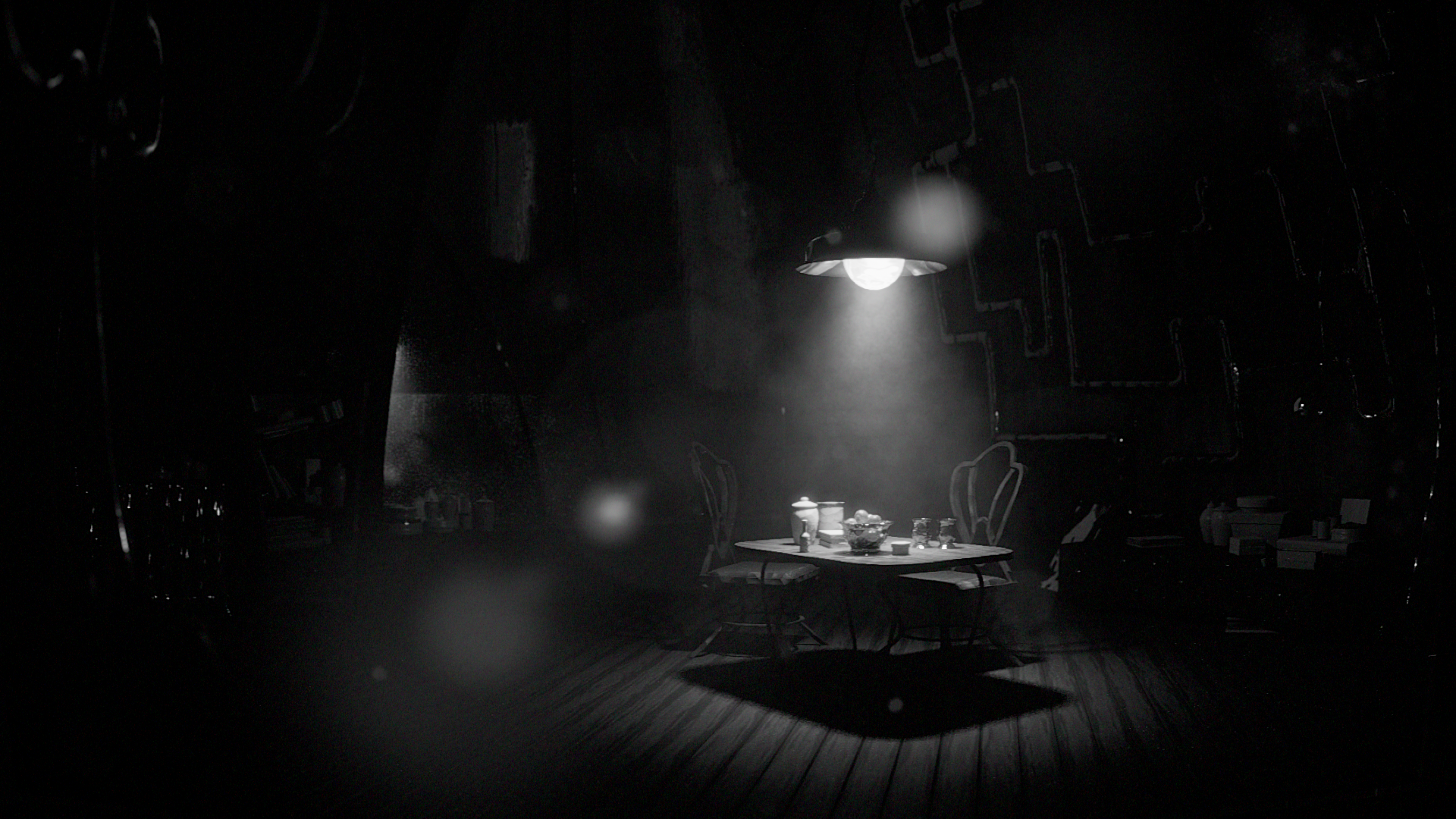 The room is in darkness except for the strong ceiling light which spotlights the table.