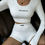 Miniatura: Conjunto Cropped manga e short fitness feminino