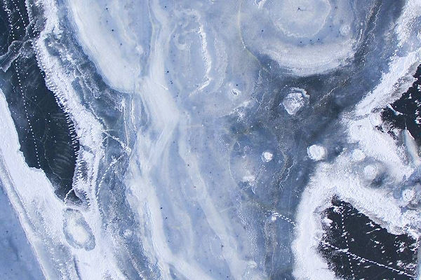 Blue Ice With Scratches On Surface.jpg