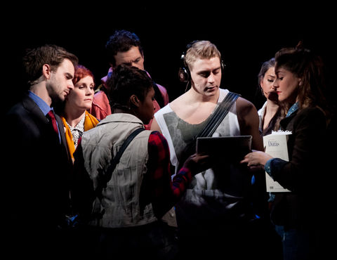 a group of people are gathered around a man