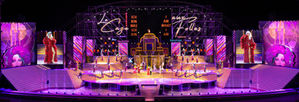 Wide colourful stage of La Cage Aux Folles