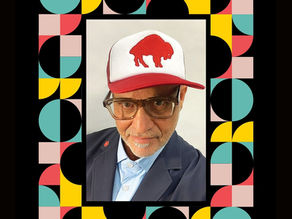 a man in a cap on a coloured background
